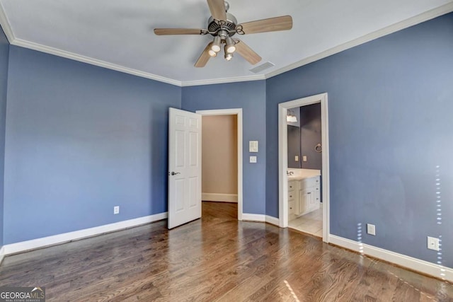10125 Brixton Pl, Suwanee, GA 30024 - unfurnished bedroom with wood finished floors, baseboards, crown molding, ensuite bathroom, and a ceiling fan