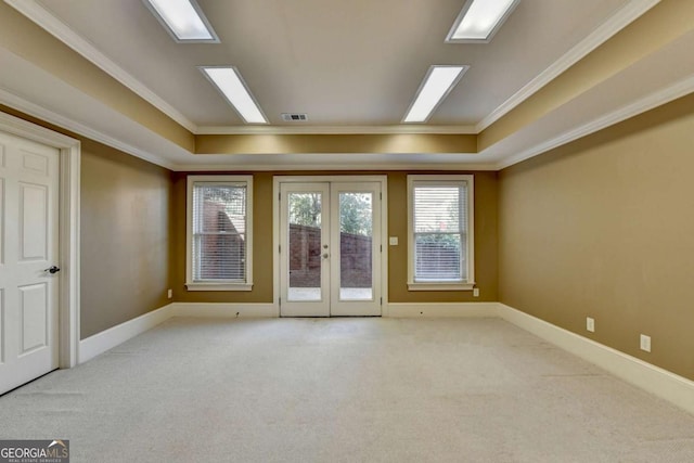 10125 Brixton Pl, Suwanee, GA 30024 - spare room featuring ornamental molding, carpet floors, baseboards, french doors, and healthy amount of natural light