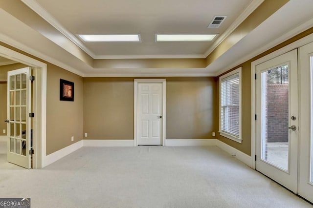 10125 Brixton Pl, Suwanee, GA 30024 - empty room with a raised ceiling, light colored carpet, crown molding, and baseboards