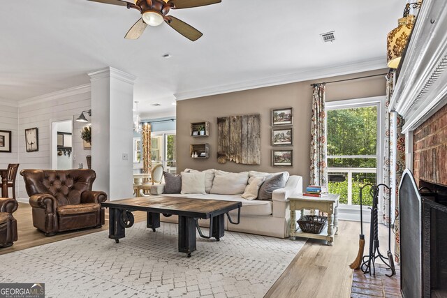 25 Highlands Way, Oxford, GA 30054 - living area featuring wood finished floors, ornamental molding, and ceiling fan