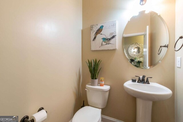 12275 Styron Dr, Hampton, GA 30228 - half bath with toilet and baseboards