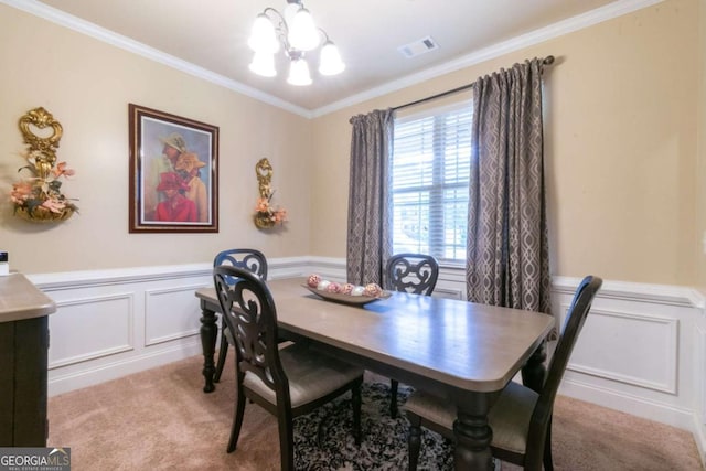 12275 Styron Dr, Hampton, GA 30228 - dining space featuring light colored carpet, ornamental molding, a chandelier, a wainscoted wall, and a decorative wall