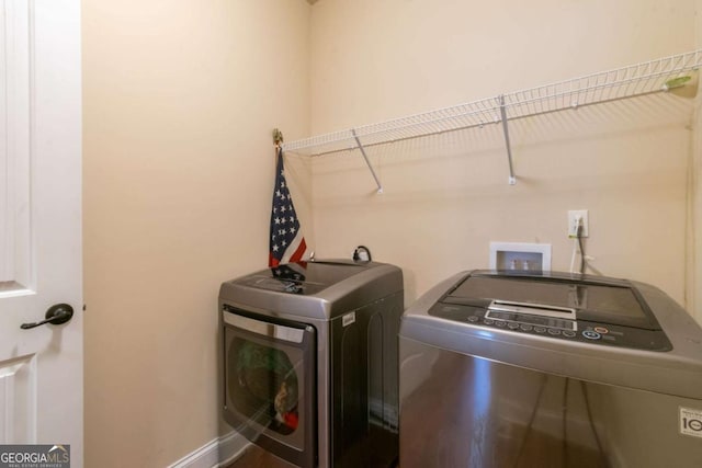 12275 Styron Dr, Hampton, GA 30228 - laundry area featuring separate washer and dryer