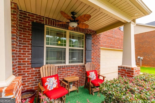 12275 Styron Dr, Hampton, GA 30228 - porch with ceiling fan and an attached garage