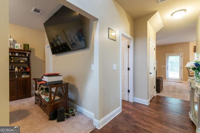 12275 Styron Dr, Hampton, GA 30228 - hallway featuring wood finished floors and carpet