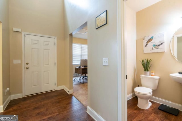 12275 Styron Dr, Hampton, GA 30228 - entryway with dark wood-type flooring