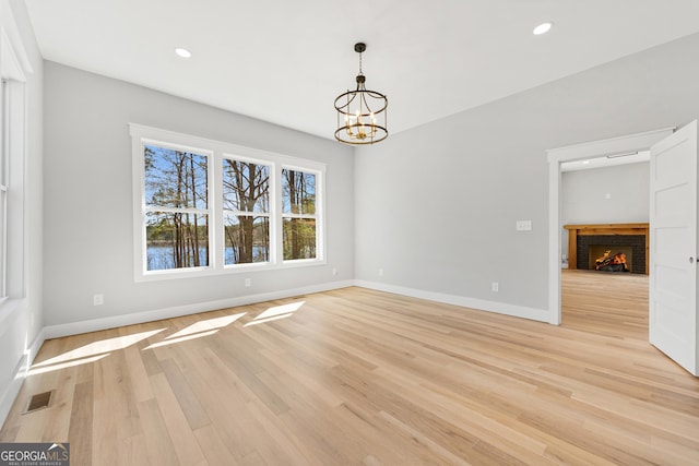 182 Cherry Rose Ln, Hartwell, GA 30643 - unfurnished room featuring a chandelier, light wood-style flooring, baseboards, and recessed lighting