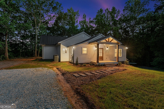 182 Cherry Rose Ln, Hartwell, GA 30643 - view of front facade featuring a porch, metal roof, a lawn, and a standing seam roof