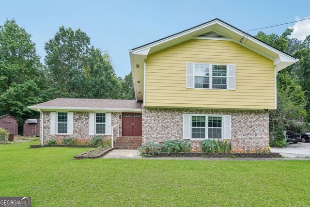 2201 Colonial Oak Way, Stone Mountain, GA 30087 - view of front of home featuring brick siding and a front yard