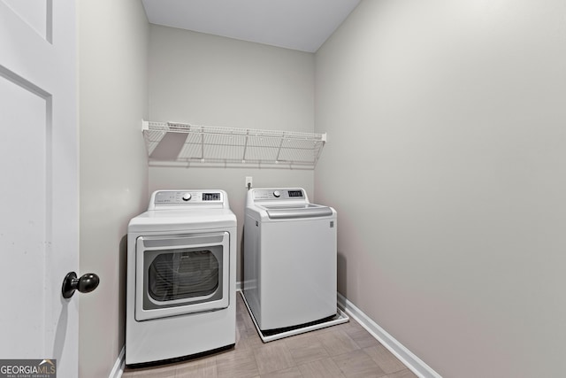74 Riverwood Trl, Grantville, GA 30220 - laundry room featuring washing machine and dryer and baseboards