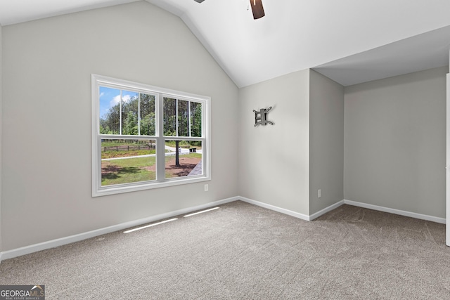74 Riverwood Trl, Grantville, GA 30220 - carpeted empty room featuring ceiling fan, lofted ceiling, and baseboards