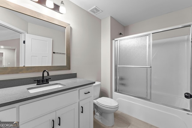 74 Riverwood Trl, Grantville, GA 30220 - bathroom featuring vanity, toilet, tile patterned flooring, and shower / bath combination with glass door
