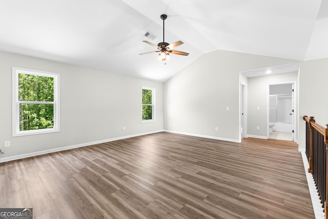 74 Riverwood Trl, Grantville, GA 30220 - unfurnished living room featuring ceiling fan, lofted ceiling, wood finished floors, and baseboards
