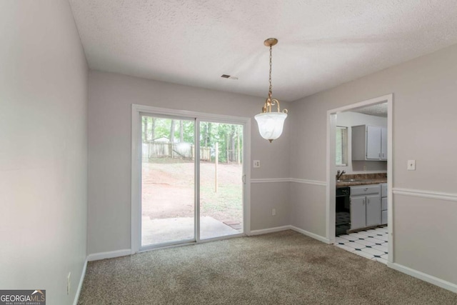 3851 Natalie Way, Ellenwood, GA 30294 - empty room with light carpet and a textured ceiling