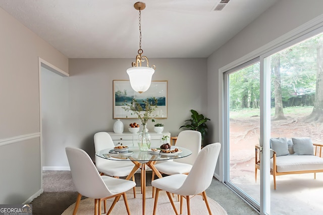 3851 Natalie Way, Ellenwood, GA 30294 - dining area with baseboards and light carpet