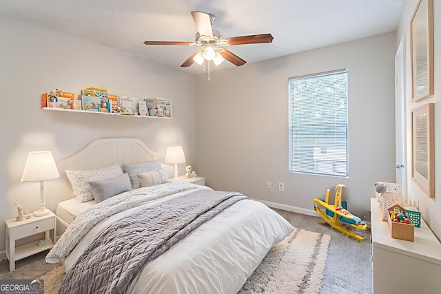 3851 Natalie Way, Ellenwood, GA 30294 - carpeted bedroom with baseboards and a ceiling fan