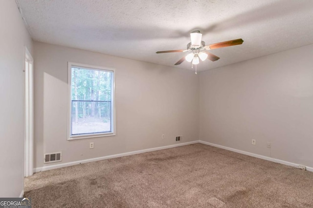 3851 Natalie Way, Ellenwood, GA 30294 - carpeted empty room with a ceiling fan and a textured ceiling