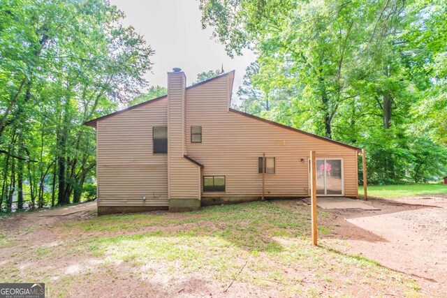 3851 Natalie Way, Ellenwood, GA 30294 - view of side of property featuring a chimney