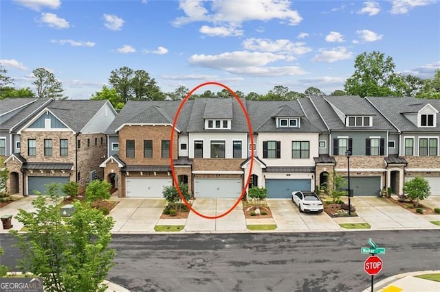 240 Walker Ave, Roswell, GA 30076 - view of property featuring a residential view, an attached garage, and driveway