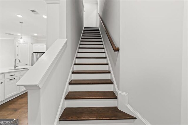 240 Walker Ave, Roswell, GA 30076 - stairs featuring recessed lighting and wood finished floors