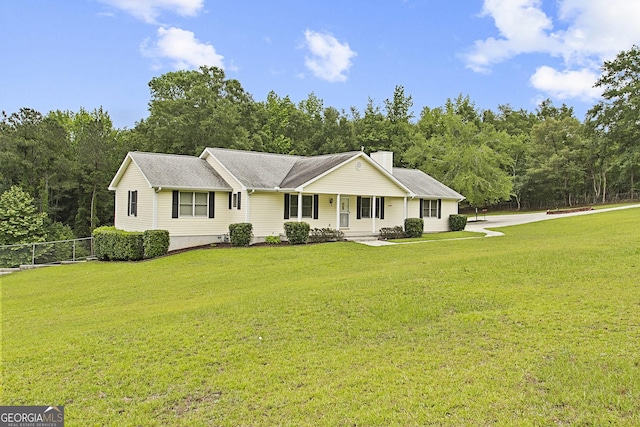 118 Hidden Hills Dr, Macon, GA 31217 - single story home with a chimney and covered porch
