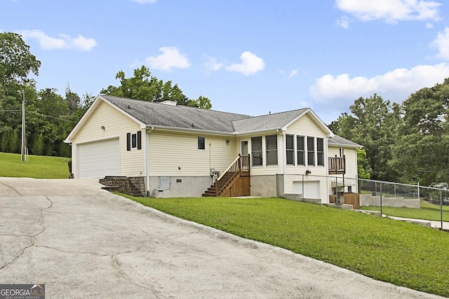 118 Hidden Hills Dr, Macon, GA 31217 - view of front of property with a garage, a sunroom, and stairway