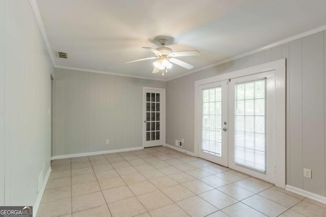 4078 Bouldercrest Rd, Ellenwood, GA 30294 - spare room with french doors, ornamental molding, a ceiling fan, and light tile patterned floors