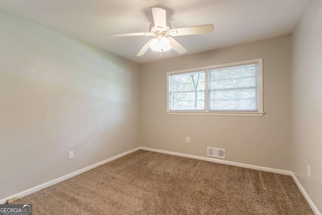 4078 Bouldercrest Rd, Ellenwood, GA 30294 - carpeted empty room featuring baseboards and ceiling fan