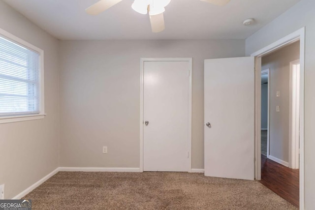 4078 Bouldercrest Rd, Ellenwood, GA 30294 - unfurnished bedroom with carpet and ceiling fan