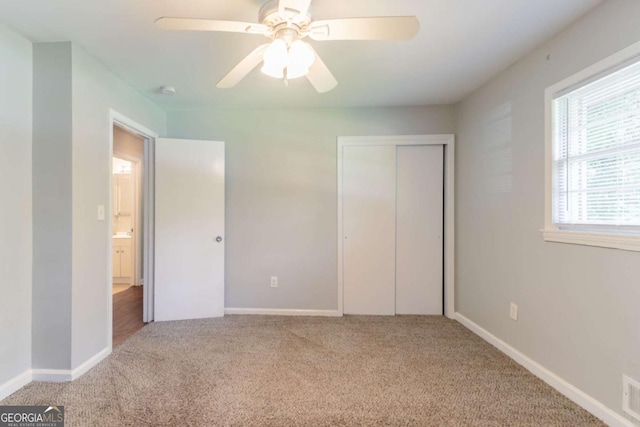 4078 Bouldercrest Rd, Ellenwood, GA 30294 - unfurnished bedroom with carpet floors, a closet, and ceiling fan