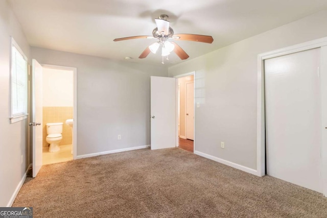 4078 Bouldercrest Rd, Ellenwood, GA 30294 - unfurnished bedroom with carpet floors, a closet, connected bathroom, and ceiling fan