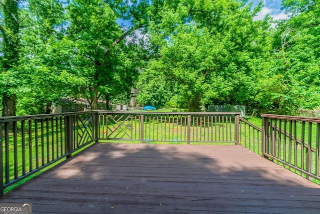 4078 Bouldercrest Rd, Ellenwood, GA 30294 - wooden deck with a yard