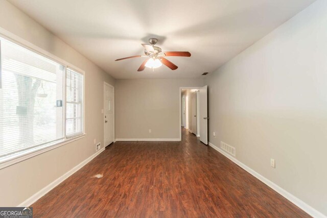 4078 Bouldercrest Rd, Ellenwood, GA 30294 - unfurnished room featuring dark wood finished floors and a ceiling fan