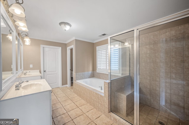 3725 Paces Park Cir SE, Smyrna, GA 30080 - full bath with a garden tub, double vanity, a shower stall, tile patterned floors, and crown molding