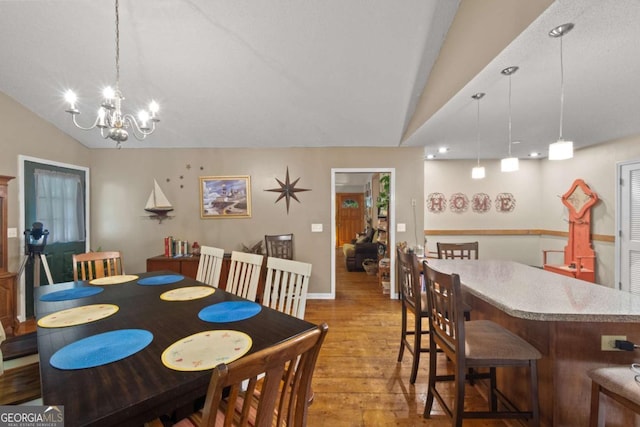 345 Jesse Martin Trl, Canton, GA 30115 - dining area featuring vaulted ceiling, light wood-type flooring, a chandelier, and baseboards