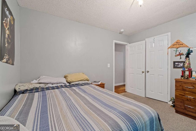 345 Jesse Martin Trl, Canton, GA 30115 - carpeted bedroom featuring a textured ceiling