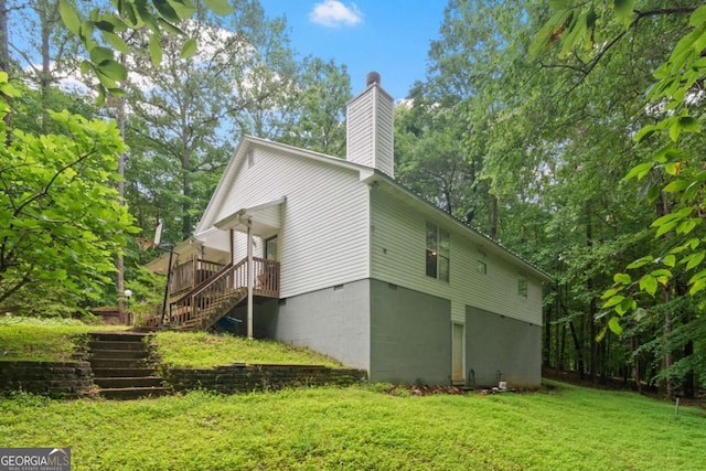 345 Jesse Martin Trl, Canton, GA 30115 - view of side of home featuring stairs, a chimney, a lawn, and crawl space