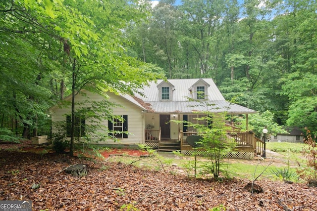 345 Jesse Martin Trl, Canton, GA 30115 - view of front of home featuring metal roof, crawl space, a deck, and a view of trees