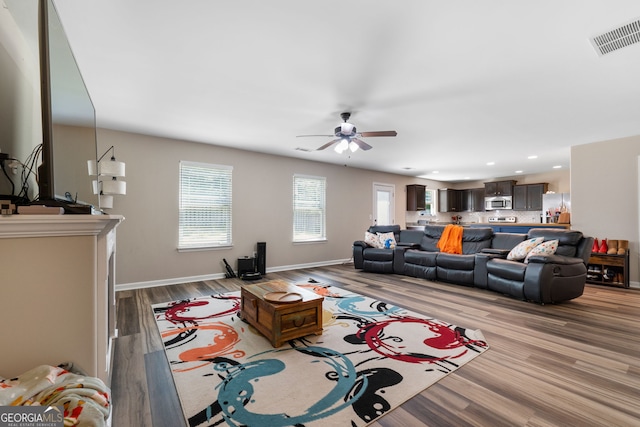 149 Pristine Dr, Locust Grove, GA 30248 - living area with ceiling fan, wood finished floors, and recessed lighting