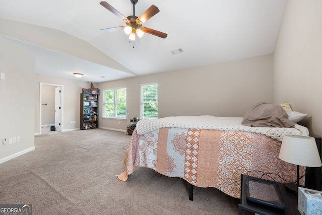 149 Pristine Dr, Locust Grove, GA 30248 - carpeted bedroom featuring lofted ceiling and ceiling fan
