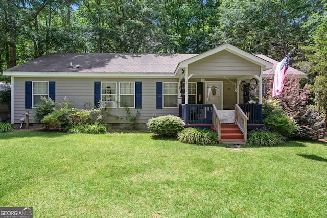3775 Tommy Lee Cook Rd, Newnan, GA 30263 - ranch-style house featuring a front yard, a porch, and a shingled roof