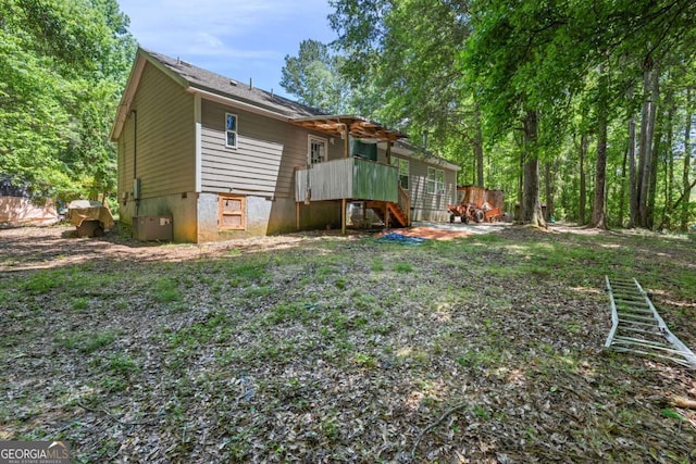 3775 Tommy Lee Cook Rd, Newnan, GA 30263 - back of property with a wooden deck and cooling unit