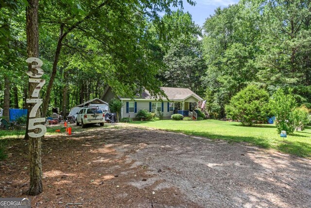 3775 Tommy Lee Cook Rd, Newnan, GA 30263 - ranch-style house featuring a front yard and driveway
