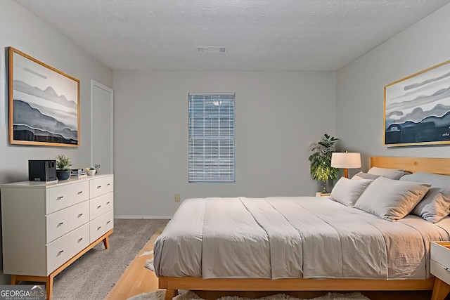 4634 Garden Hills Dr, Stone Mountain, GA 30083 - carpeted bedroom with a heating unit and baseboards