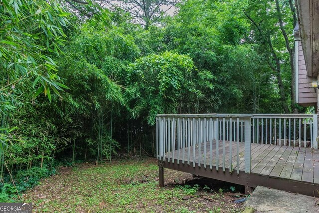 4634 Garden Hills Dr, Stone Mountain, GA 30083 - view of yard featuring a wooden deck