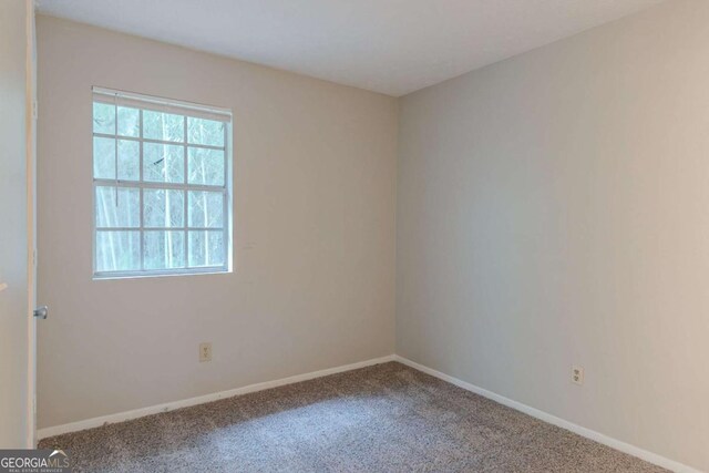 4634 Garden Hills Dr, Stone Mountain, GA 30083 - empty room featuring carpet floors