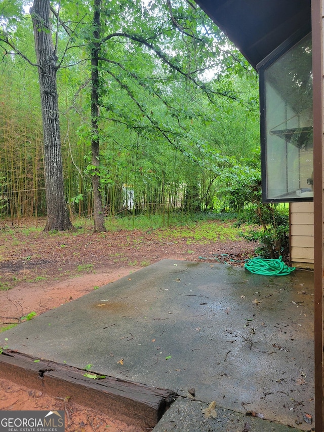 106 Garden Trl, Stockbridge, GA 30281 - view of patio with a view of trees