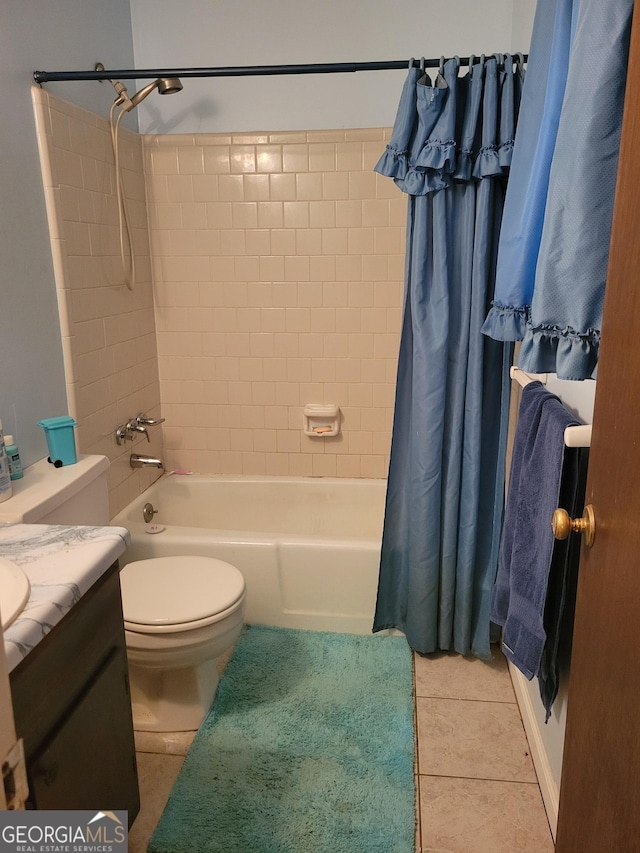 106 Garden Trl, Stockbridge, GA 30281 - bathroom with tile patterned floors, toilet, shower / bathtub combination with curtain, and vanity