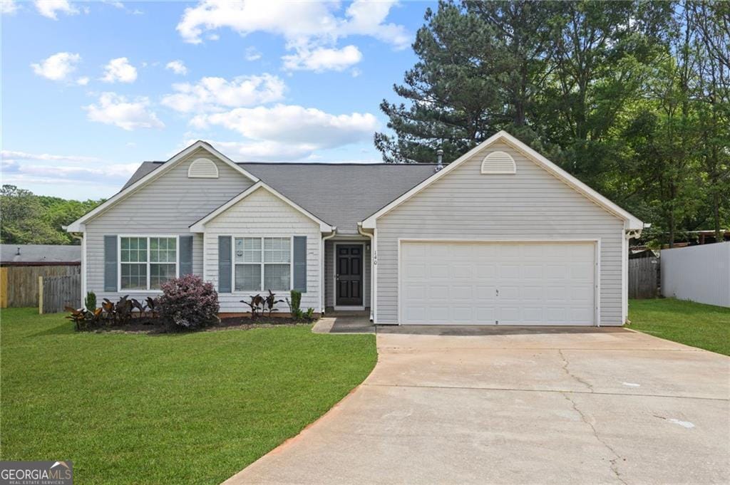 140 Tillman Ct, Mcdonough, GA 30253 - ranch-style home with concrete driveway and an attached garage