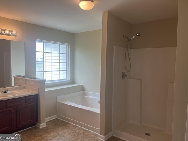 901 Broderick Cir, Warner Robins, GA 31088 - bathroom with a bath, vanity, and a shower